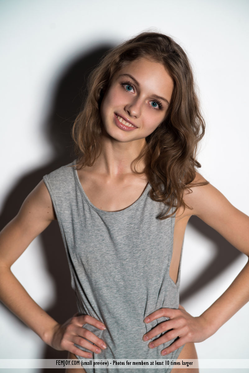 Skinny Teen Elvira U Bares Tiny Tits And Spreads Long Legs On Floor