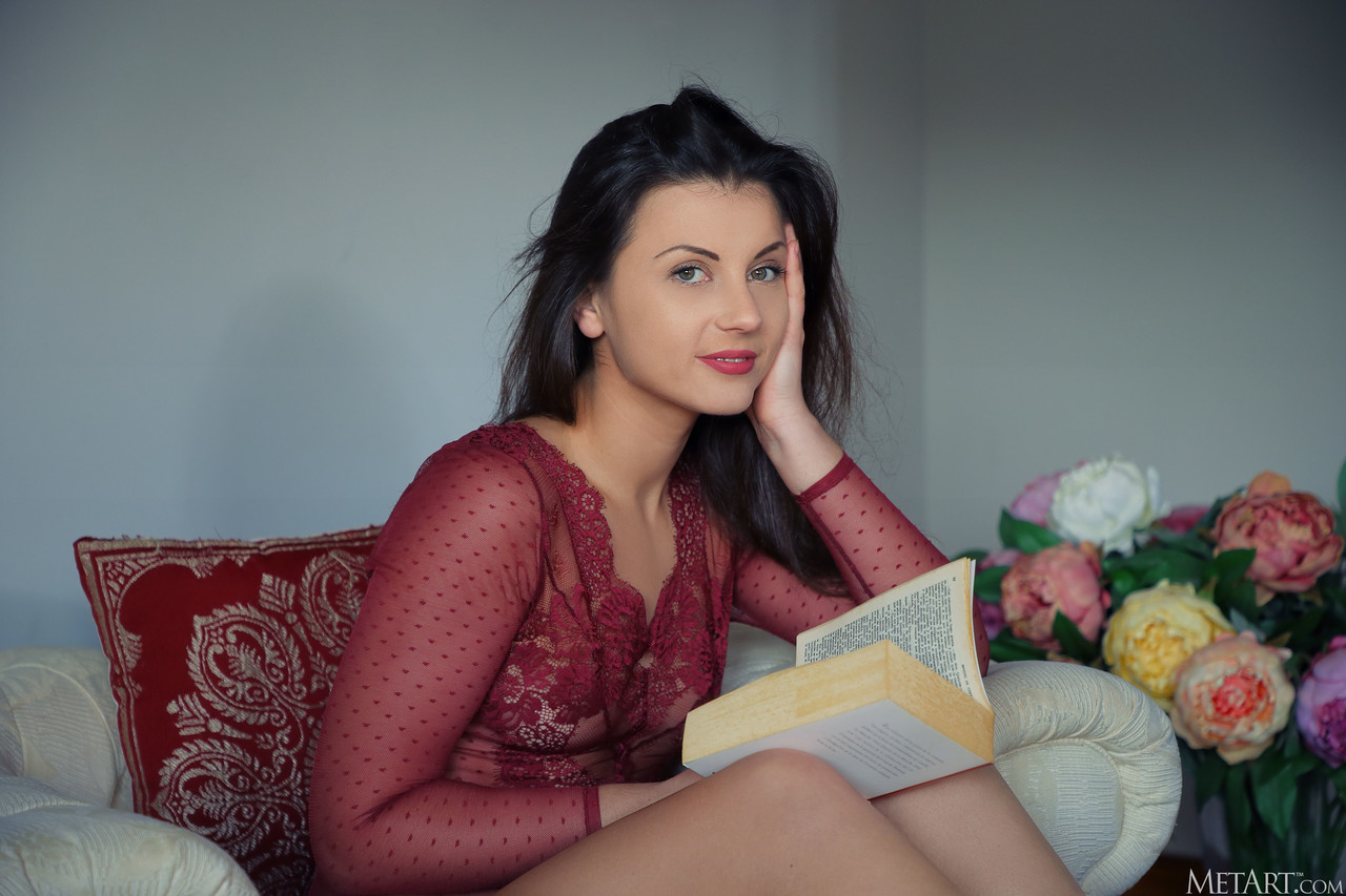 Dark-Haired Beauty Nora Roam Spreads Long Legs To Show Hairy Twat