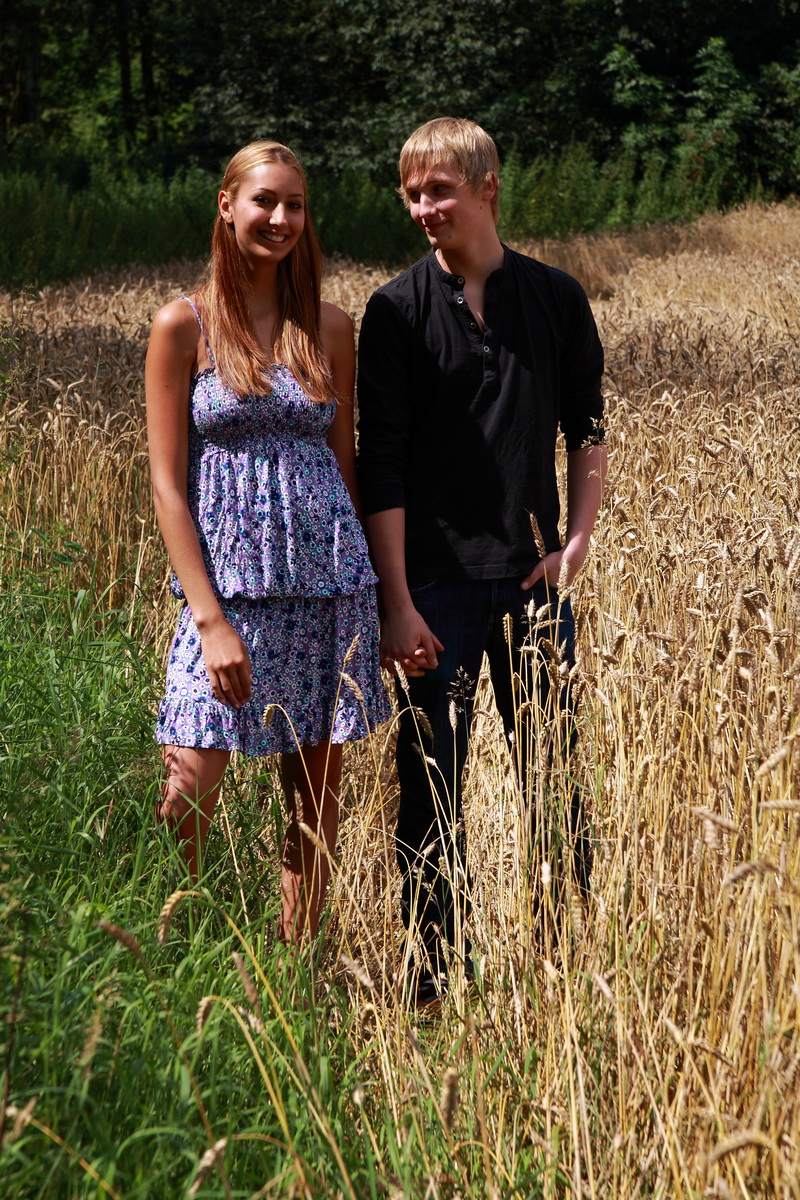 Young Couple Have Sexual Intercourse In A Field Of Ripened Wheat