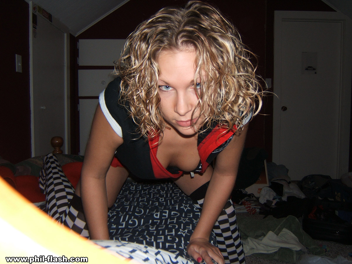 Cute Blonde Strikes Tempting Solo Poses During Safe For Work Action