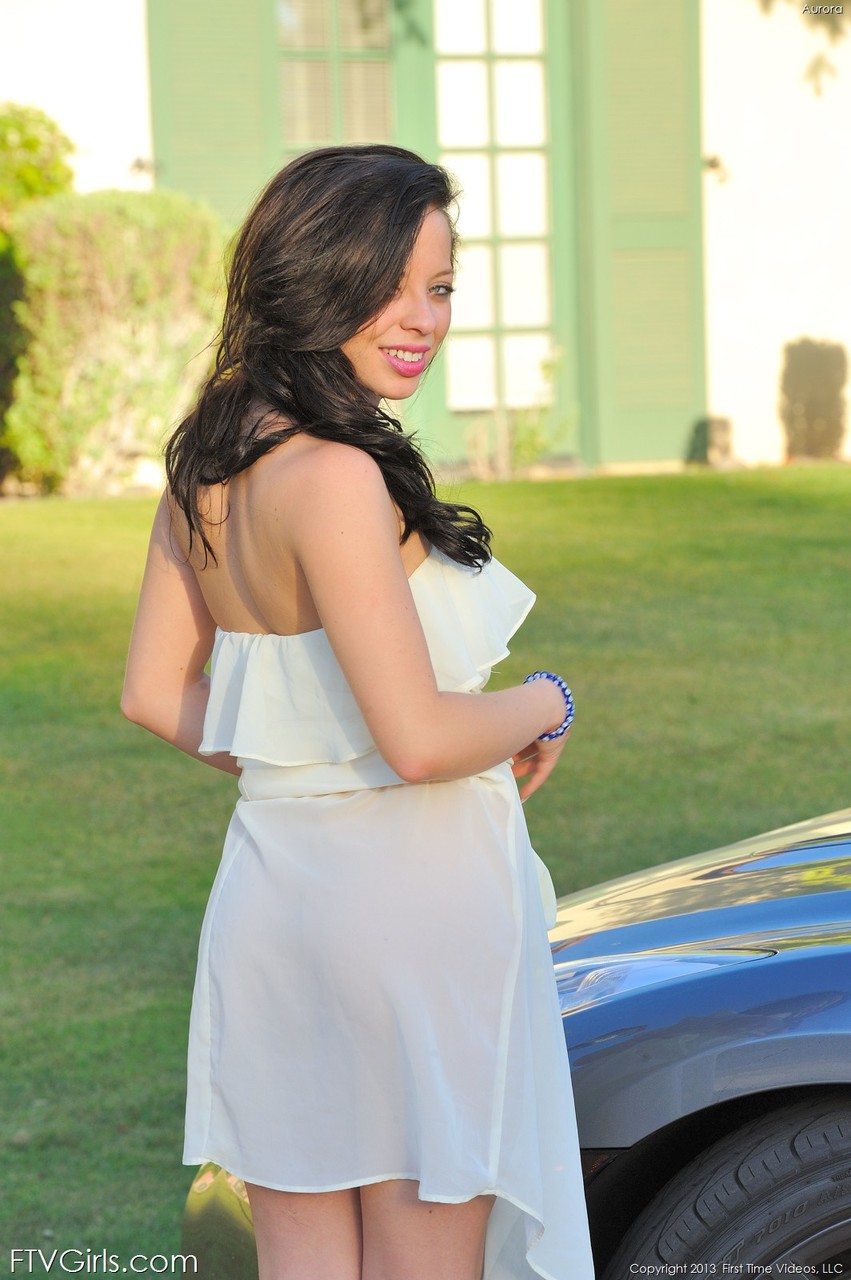 Brunette Babe Aurora Flaunts Nice Ass In Fountain