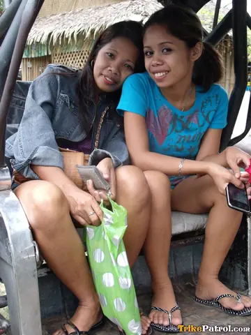 Two Filipinas Share a Tourist in a Public Threesome