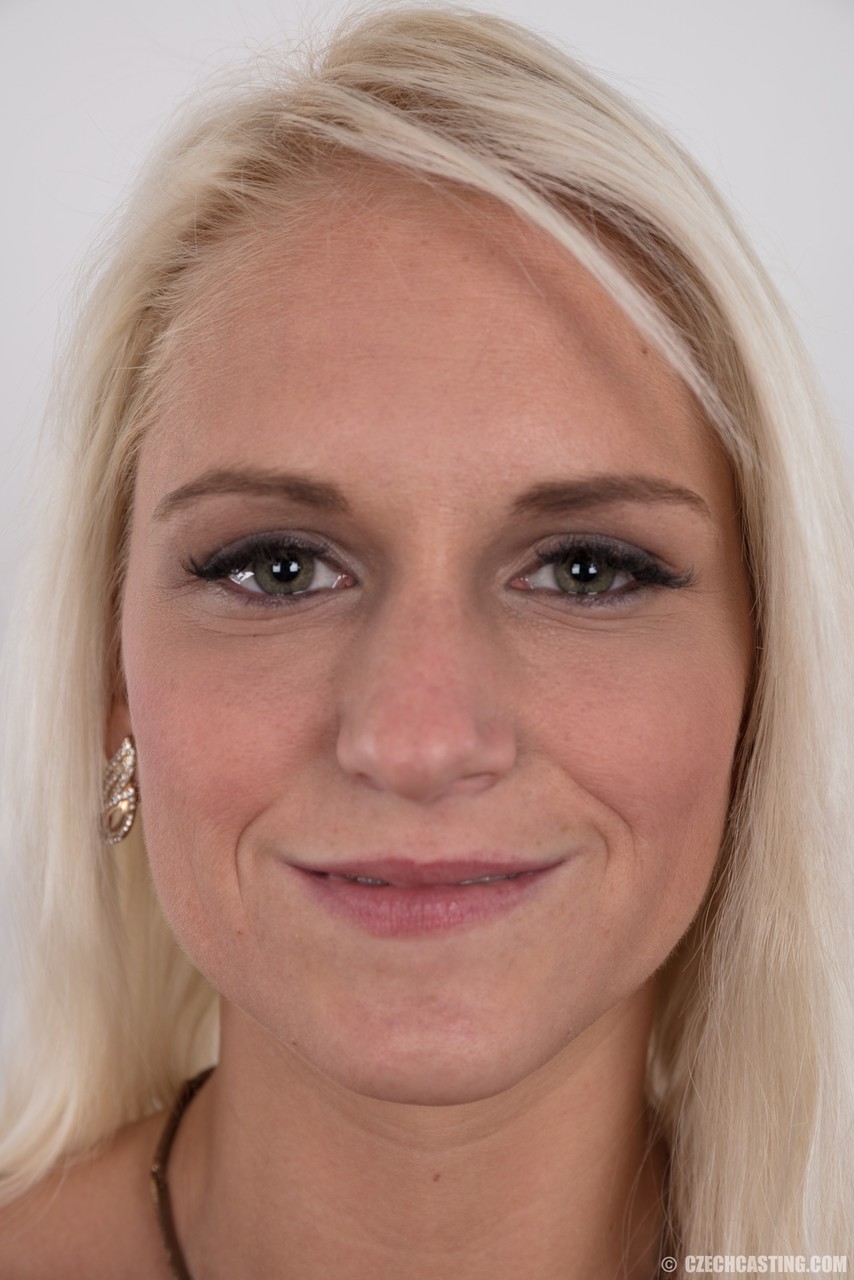 Blonde Strips Jeans And Black Thong To Pose Nude