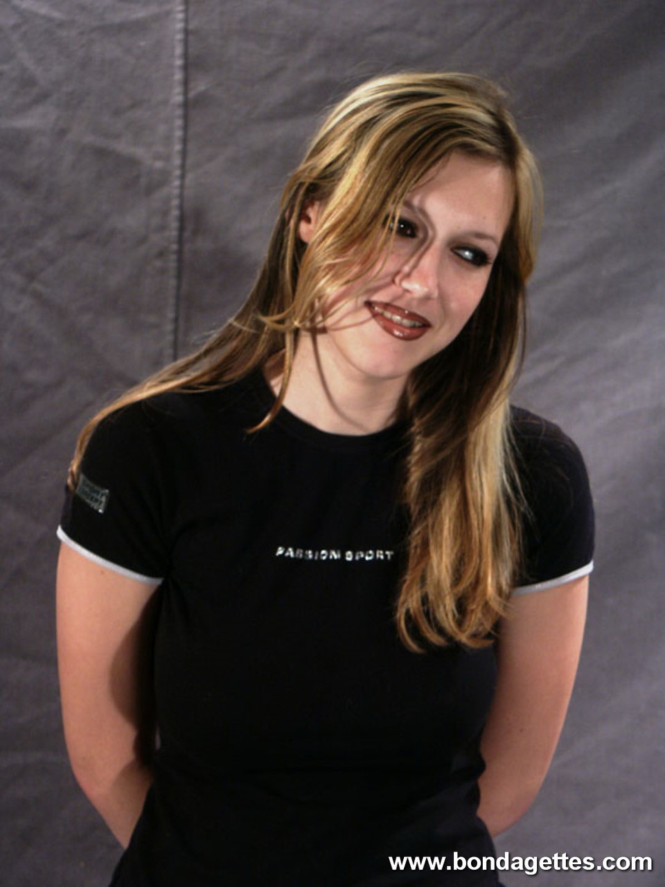 Forced Blonde Girl Smokes Cigarette