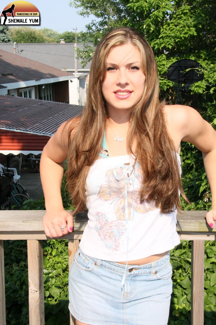 Long-Haired Shemale Chrissy Snow Strips And Sunbathes On Balcony