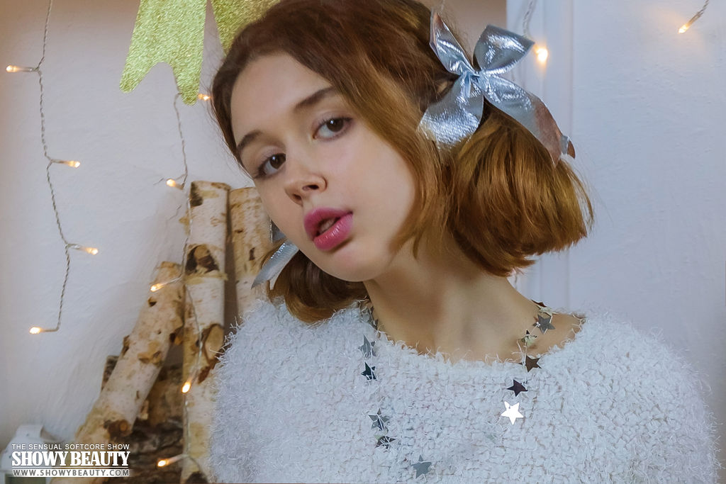 Redheaded Teen Riccarda Reveals Full Breasts In White Nylons