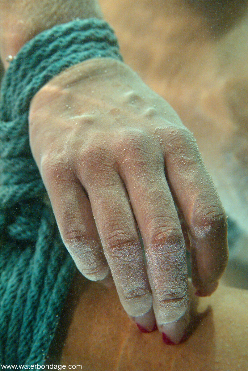 Nude Isis Love Performs Water Bondage