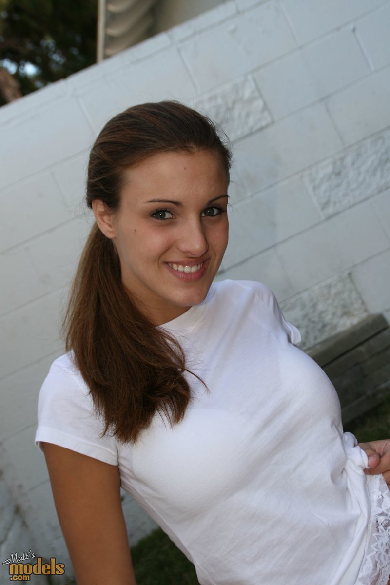 Naked First Timer Andie Poses On Towel Outdoors