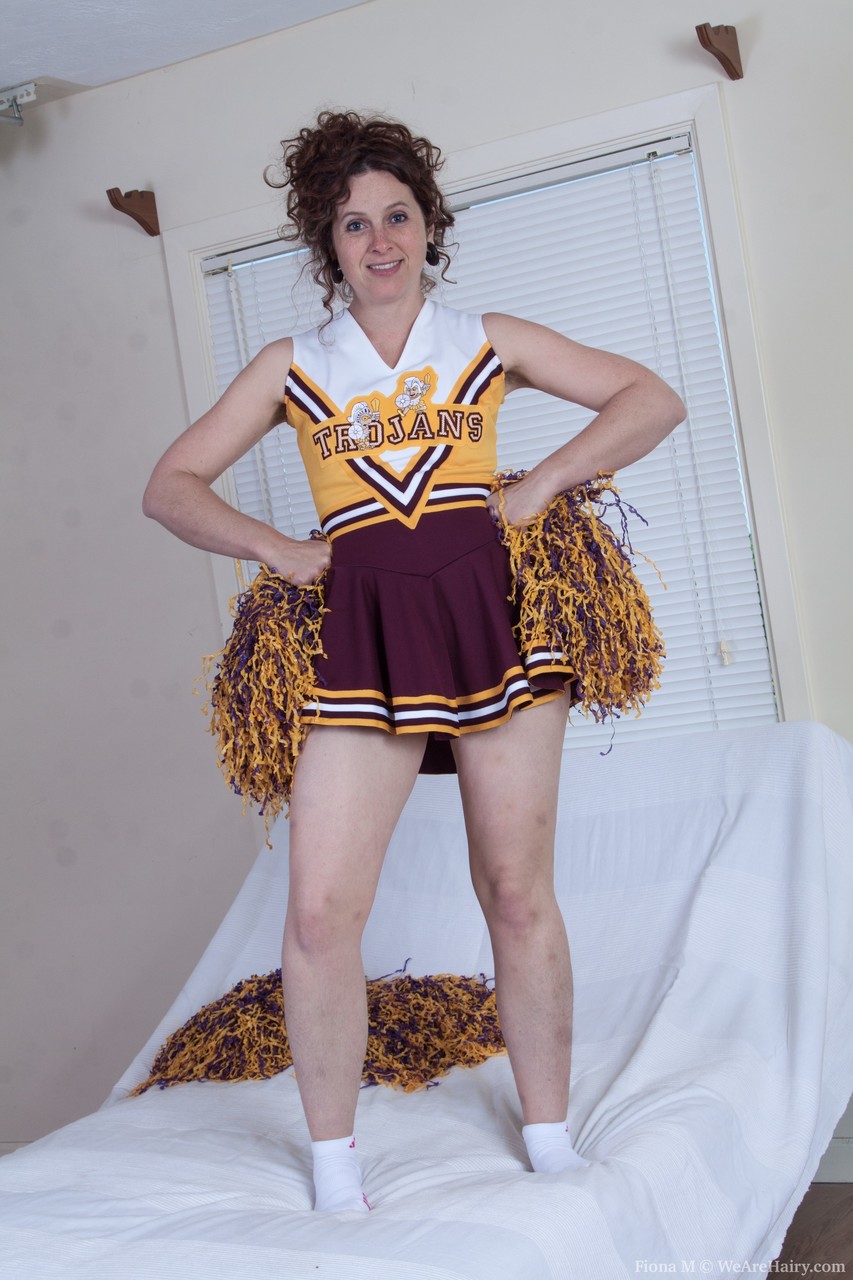 Lusty Cheerleader Fiona M Strips And Dances To Show Her Hairy Twat