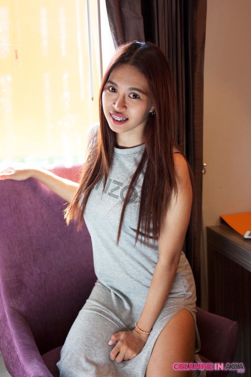 Gorgeous Asian Babe Ploy Strips And Shows Tiny Tits And Hairy Pussy