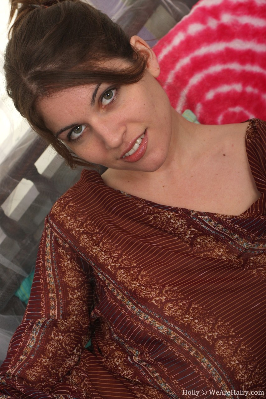 Beautiful Amateur Babe Holly Strips And Shows Off Her Furry Pussy