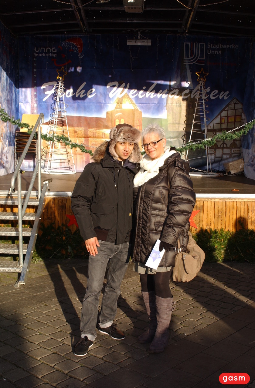 Short-Haired German Housewife Flirts With Young Man At Christmas Market