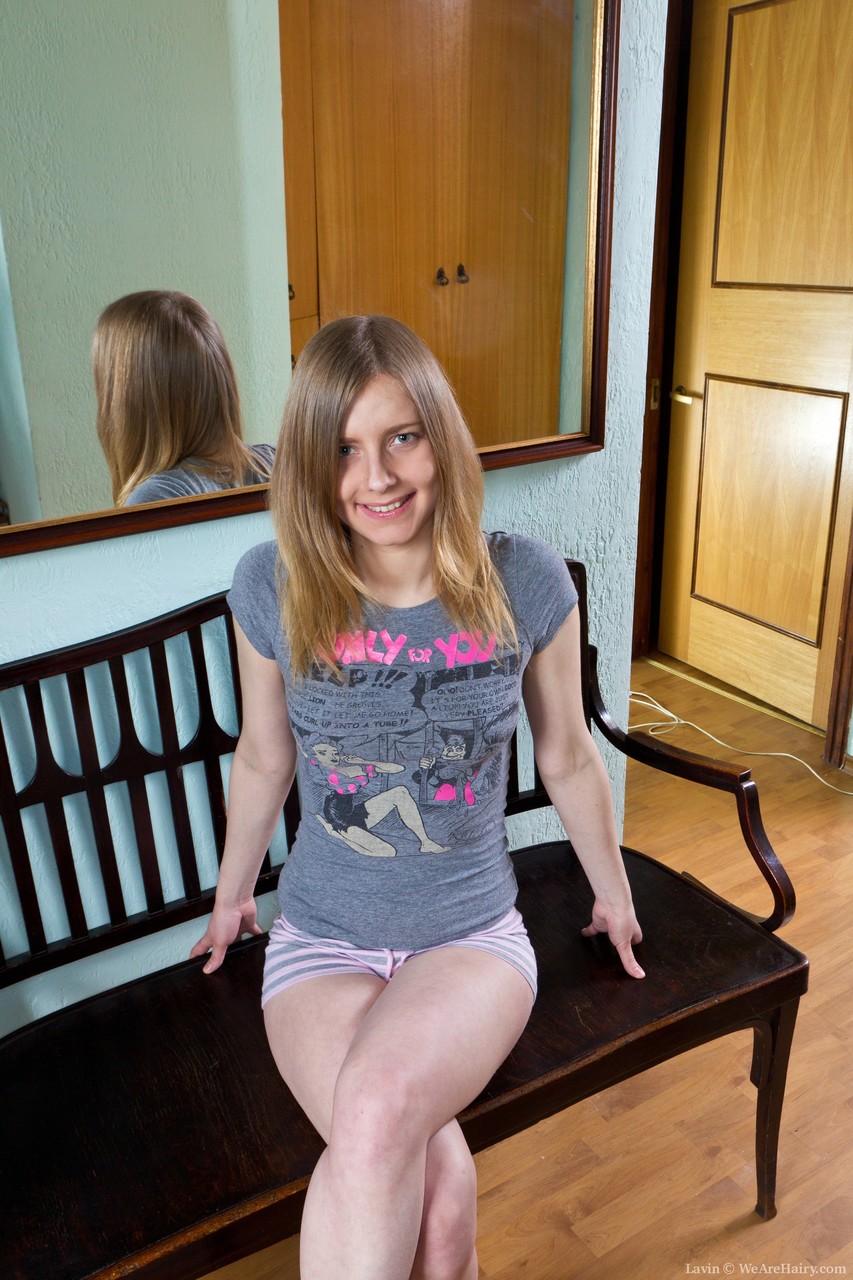 Naughty Lavin Squeezes Tiny Breasts And Shows Unshaved Pussy While Stripping