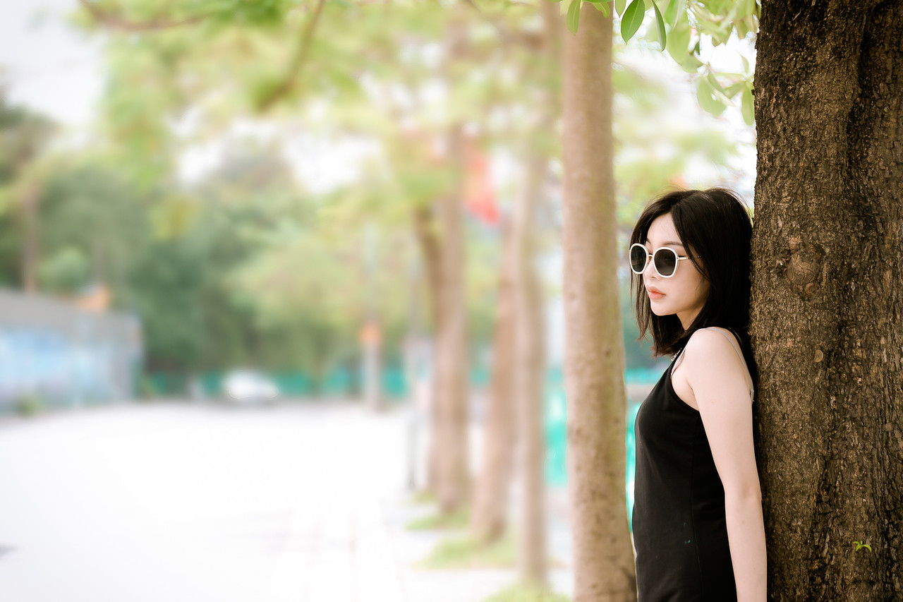 Pretty Asian Babe Shows Her Big Ass While Teasing In A Sexy Black Dress