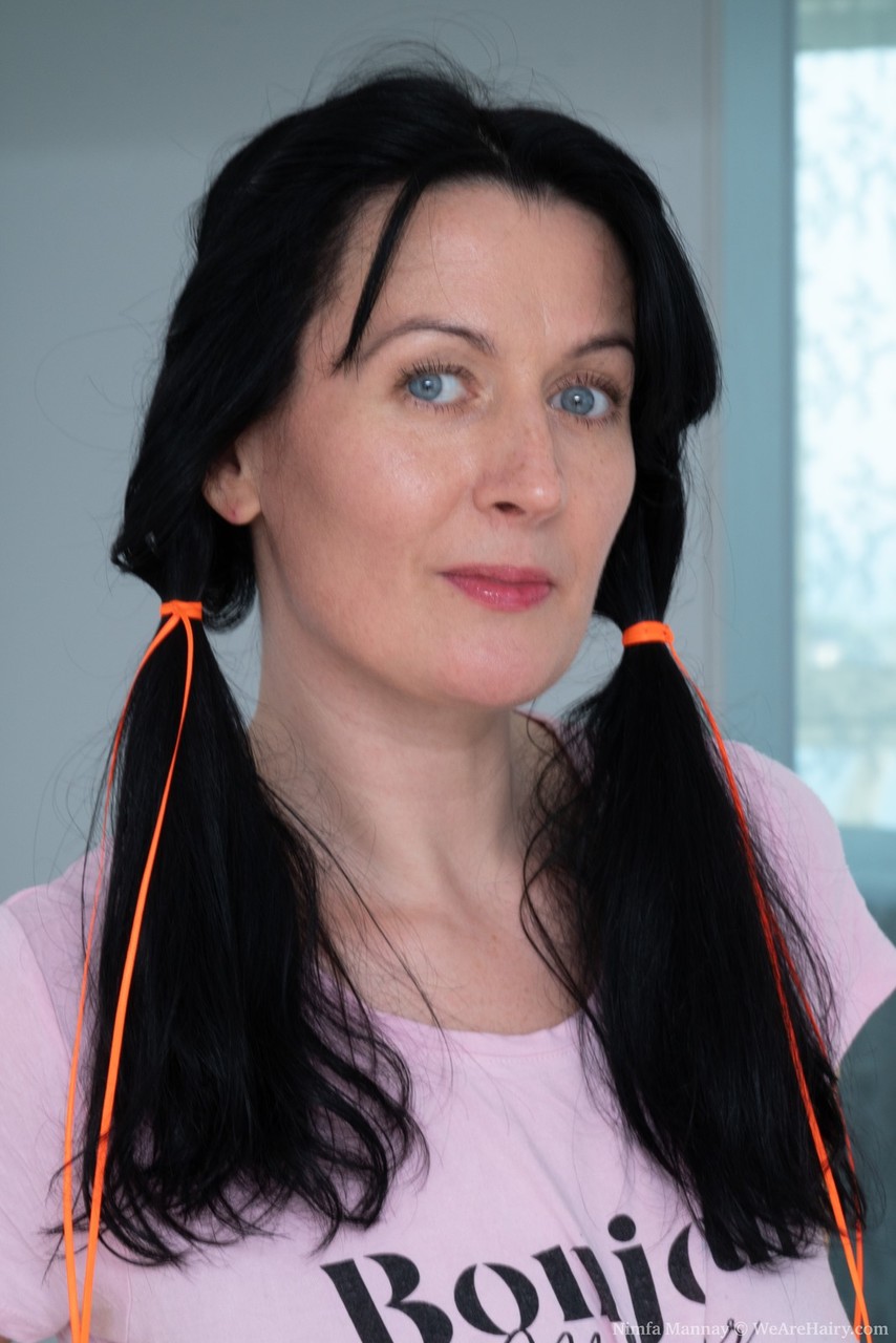 Hirsute Amateur Nimfa Mannay Stretches Her Natural Pussy Before Vacuuming