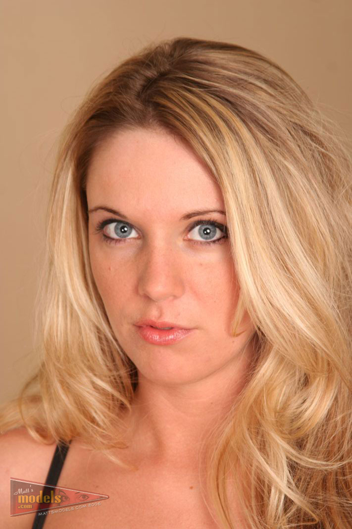 Blonde Amateur A J Bailey Undoes Bra To Model Naked On Bed