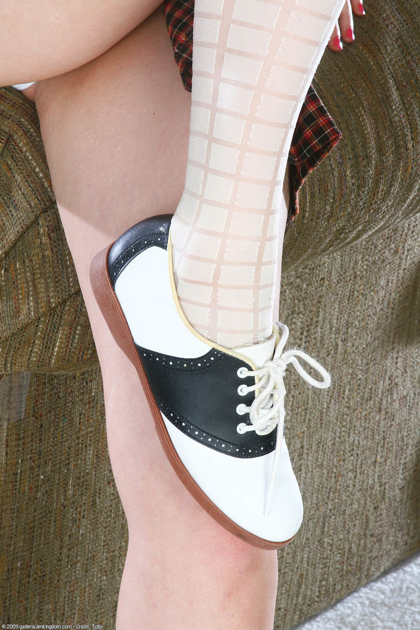 Sweet Teen Rikki Shows Small Tits And Shaved Pussy