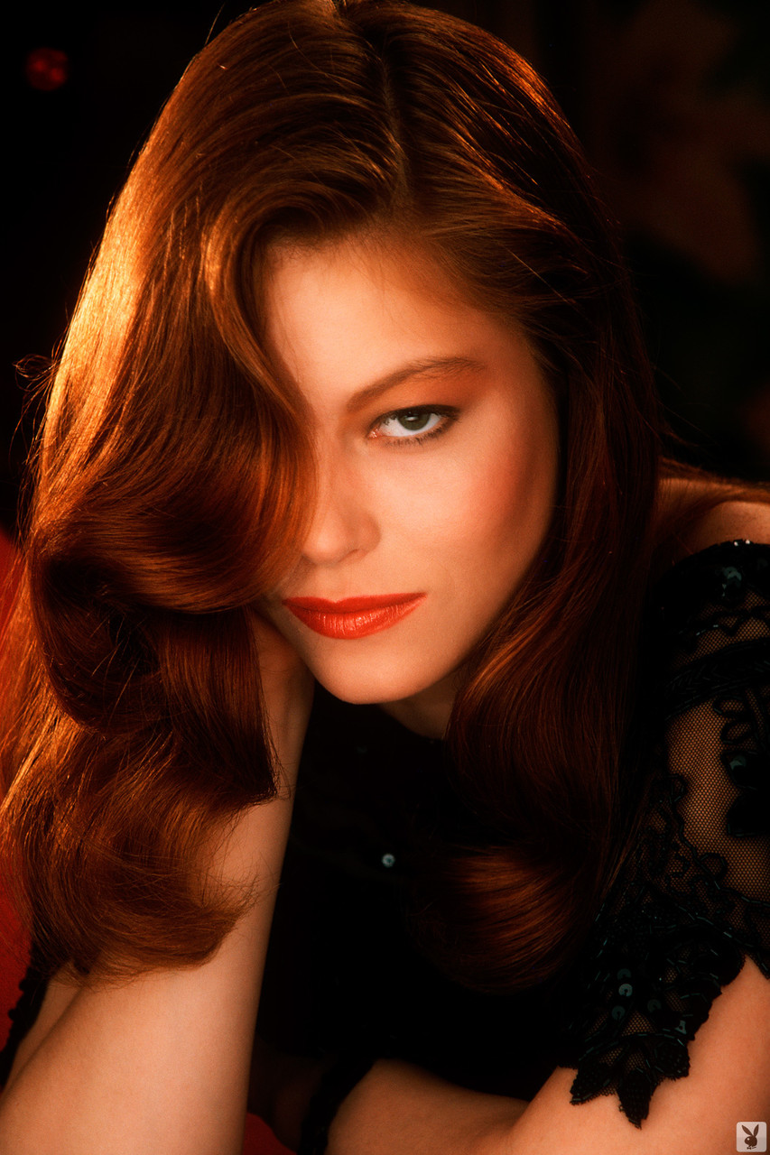 Provocative Redhead Laura Richmond Poses Nude In Stockings