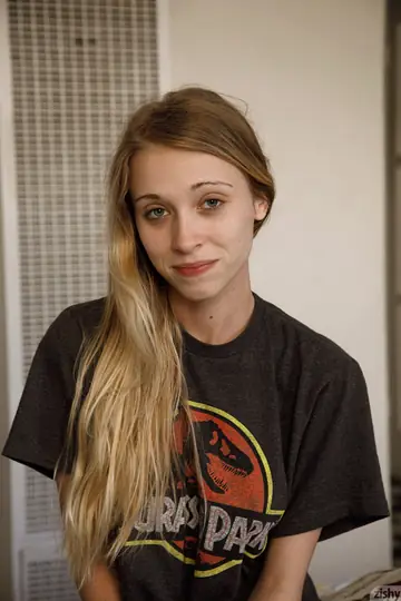 Riley Anne – Skinny Blonde Poses Clothed and Spreads Her Legs