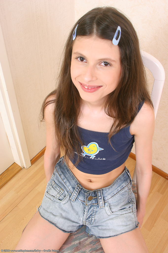 Petite Brunette Faina Spreads Her Hairy Pussy Up Close