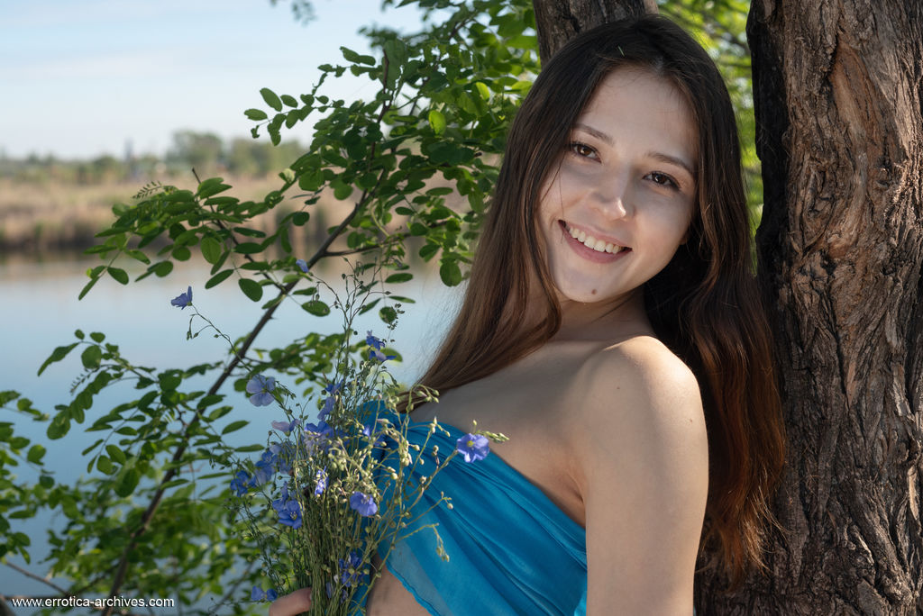 Naked Brunette Teen Maat Against Tree Near Water