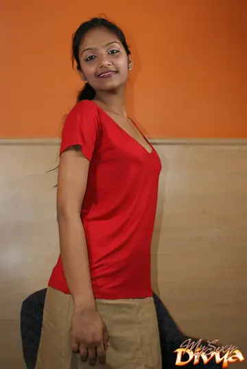Divya Yogesh – Asian Brunette Flashes Her Panties While Eating an Orange