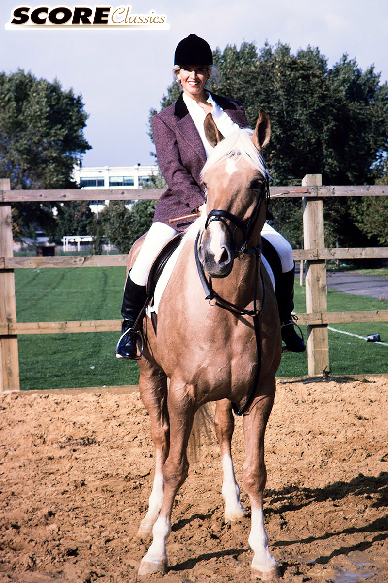 Busty Dusty Pours Water Over Her Mega Tits In The Stables