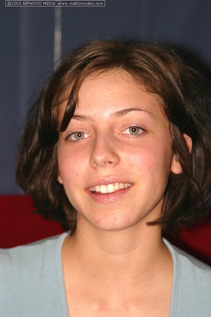 Young Brunette Model Nico Uncovers Her Pert Tits While Parting Pussy Lips