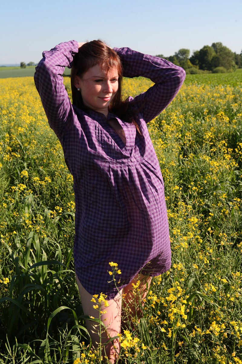 Young Redhead Alka Strips Shirt Going Naked In Rapeseed Field