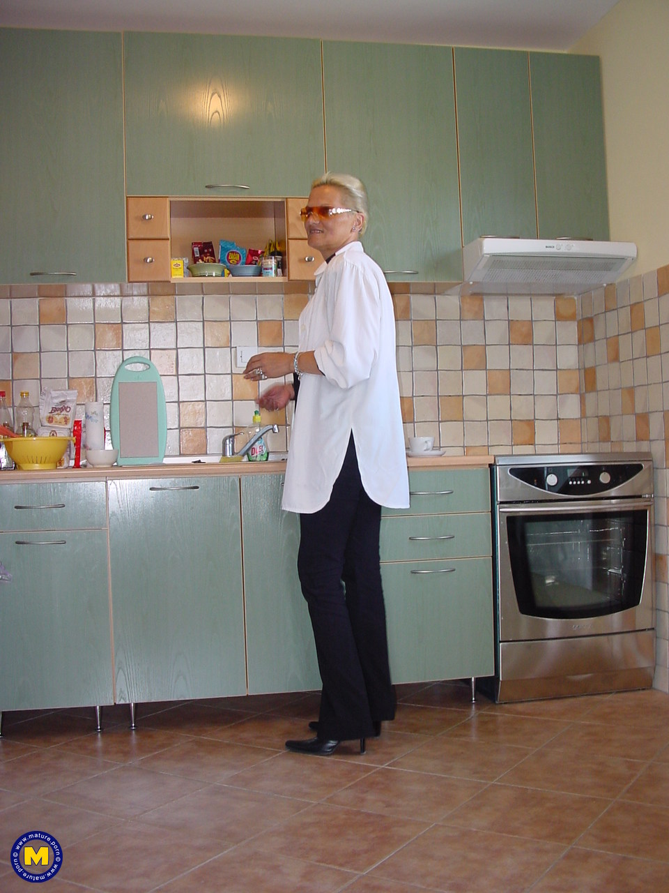 Helga The Granny With Round Ass Strips And Masturbates All Over House