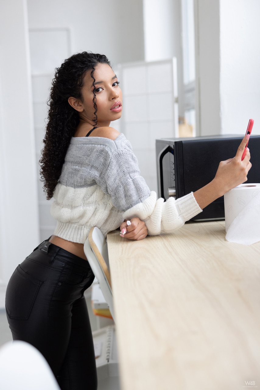 Curly-Haired Beauty Valery Ponce Strips And Poses In Erotic Compilation