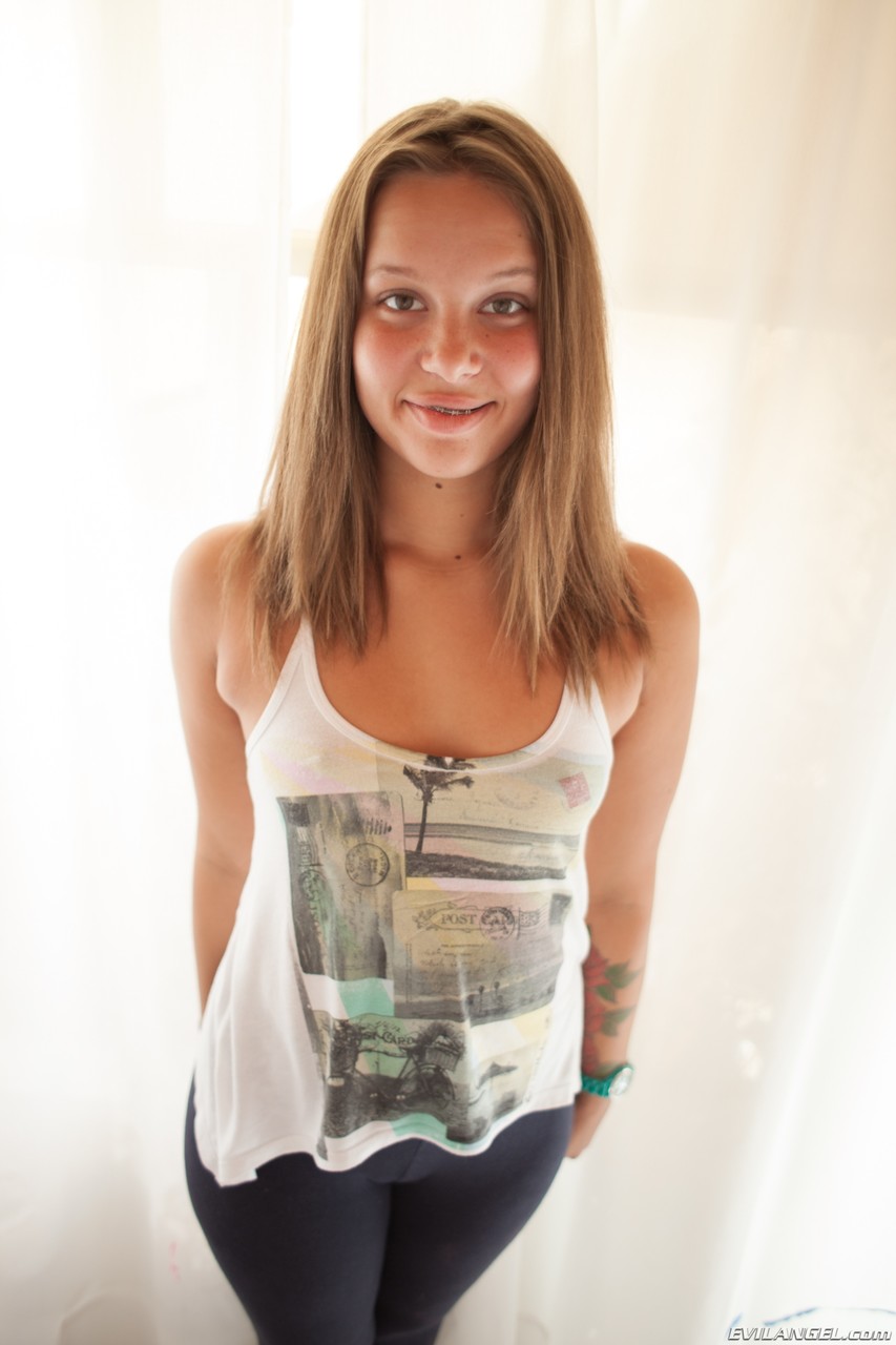 Innocent Doll Liza Rowe Teases With Bubble Butt And Hairy Pussy