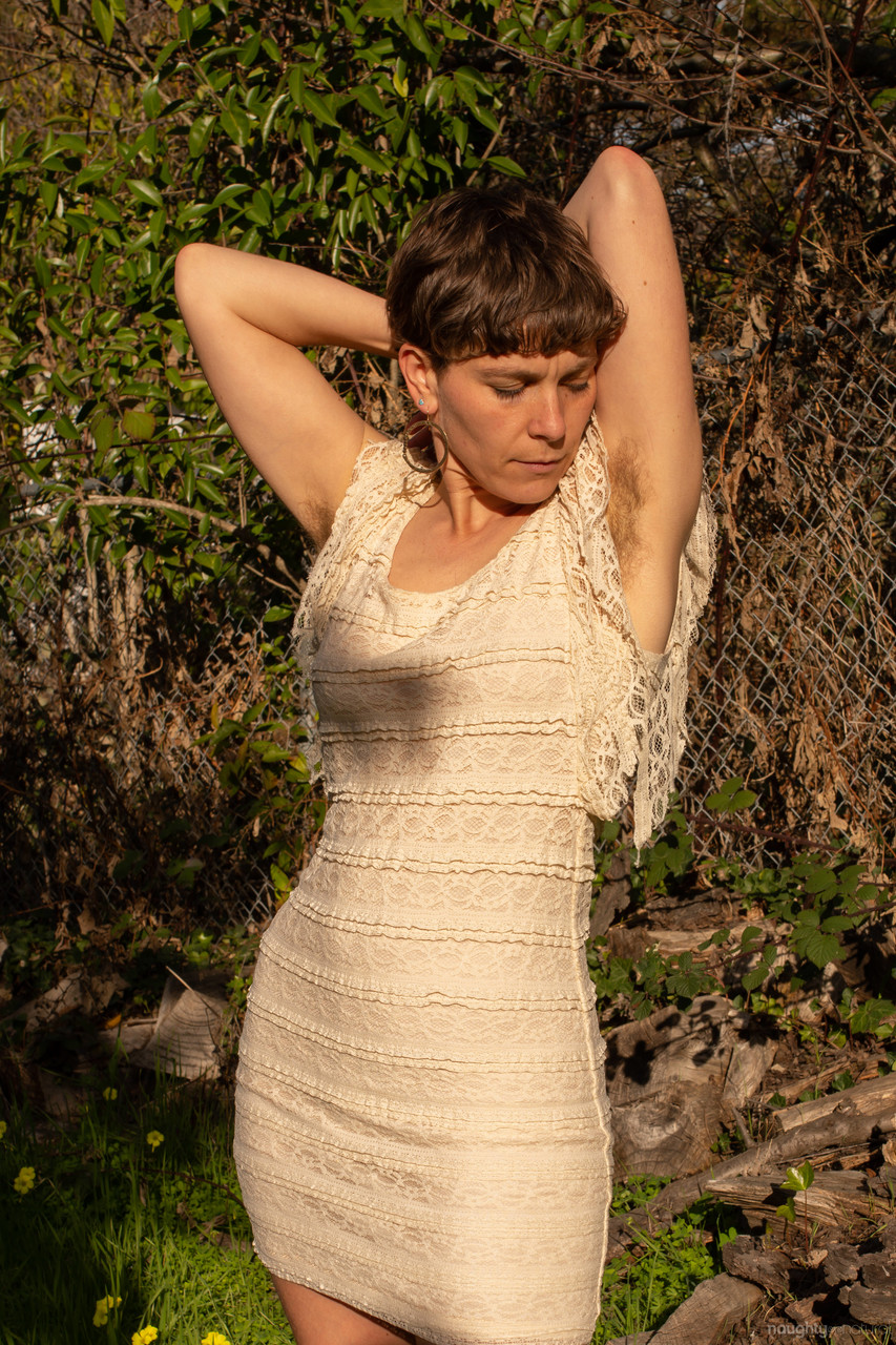 All-Natural American Cookie Undresses In Garden And Shows Hairy Body