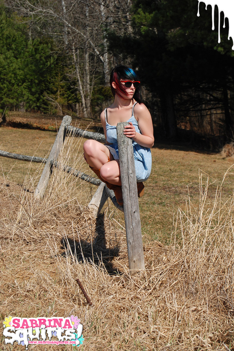 Chubby Teen Sabrina Squirts Exposes Big Butt Over Rustic Fence