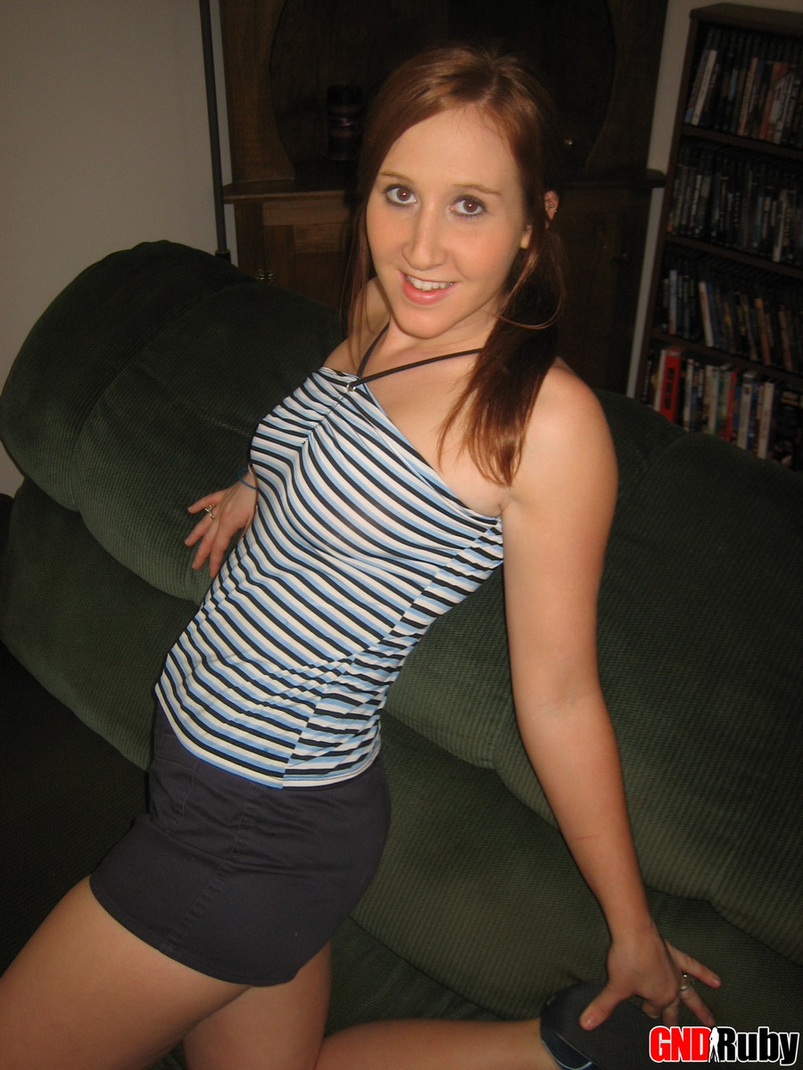 Redhead Teen Strips Naked On Sofa While Wearing Running Shoes