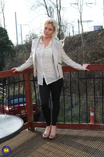 Kelly Cummings – Two Blonde European MILFs in Dresses and Glasses Pose Outdoors