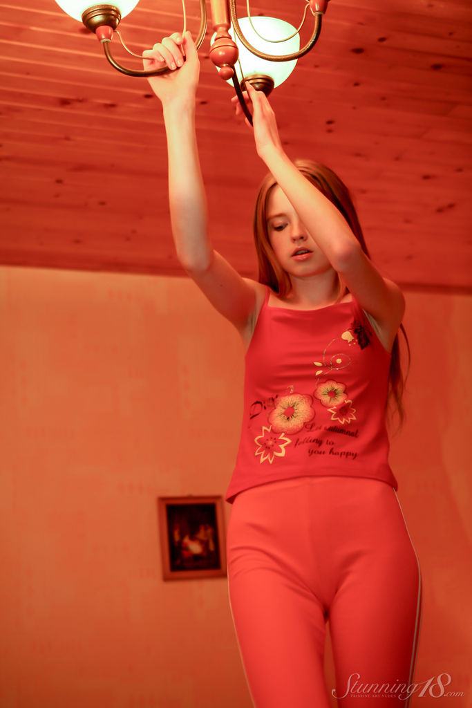 Avril A: Topless Redhead Teen On Bed In Capris