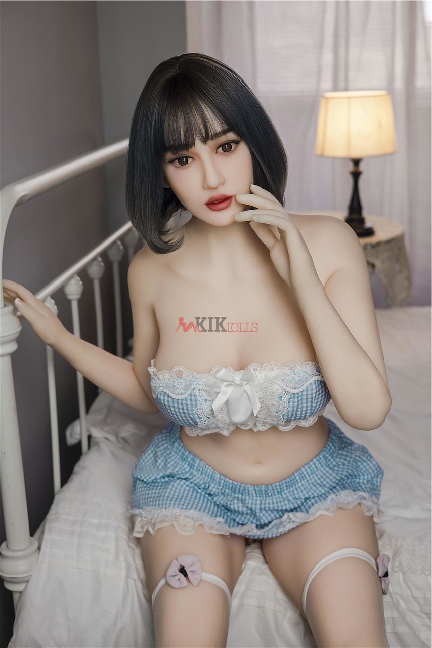 Miya Brunette Sex Doll Posing Topless Bedroom Showing Big Tits