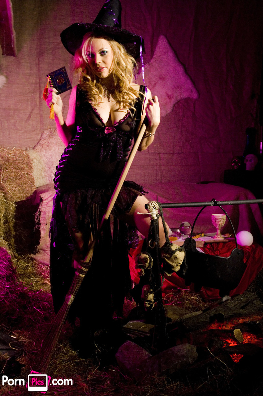 Alicia Rhodes: Busty British Witch Posing with Big Tits