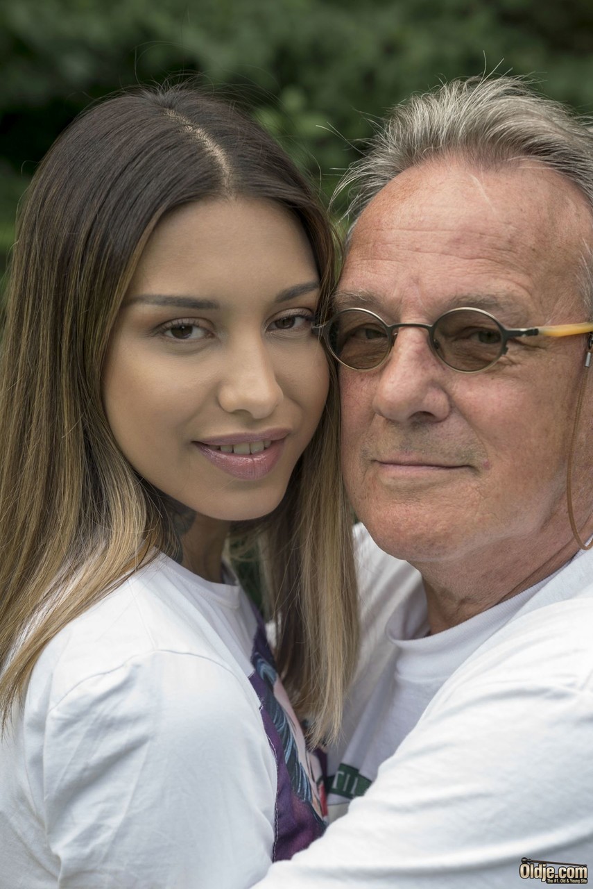 Brunette Tattooed Roxy Lips Rides Old Daddy Cock Outdoors