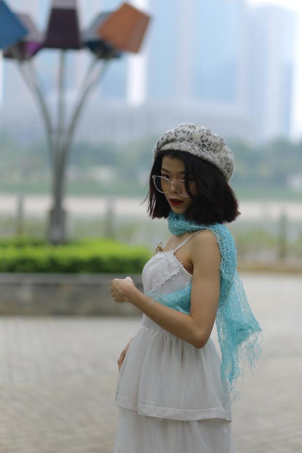 Irena Posing In White Dress With Hat And Glasses