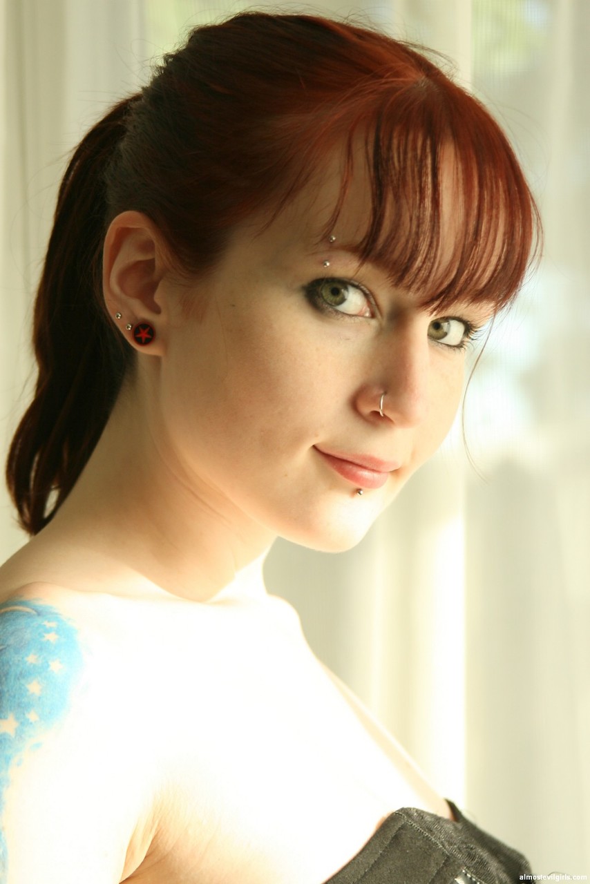 Tattooed Redhead Delila Rose Slides Satin Panties Aside To Expose Her Snatch