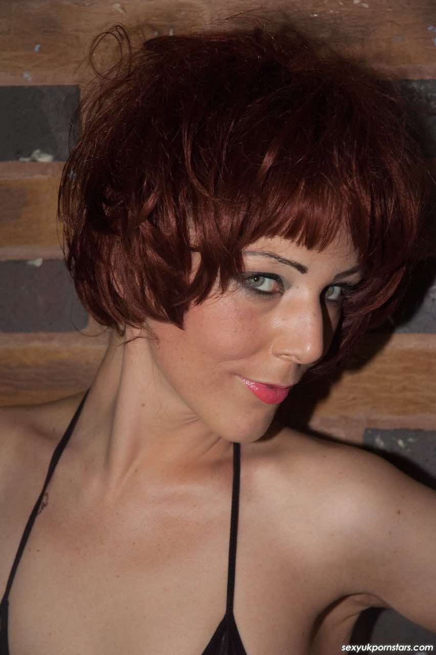 Redhead Chick Porscher Wells Slides Black Lingerie Aside To Reveal Her Snatch