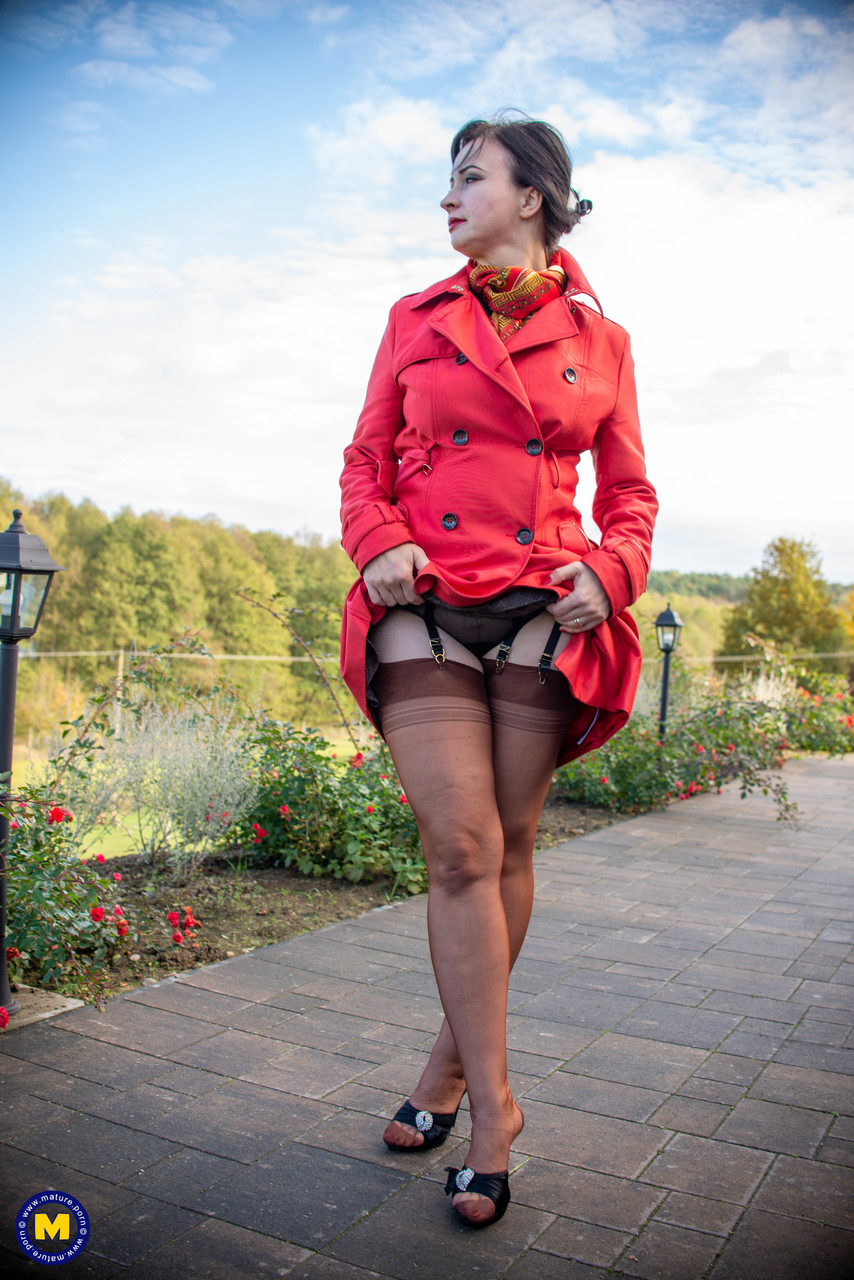 Mature Woman Disrobes to FF Nylons Prior to Toying Her Pussy on Bed