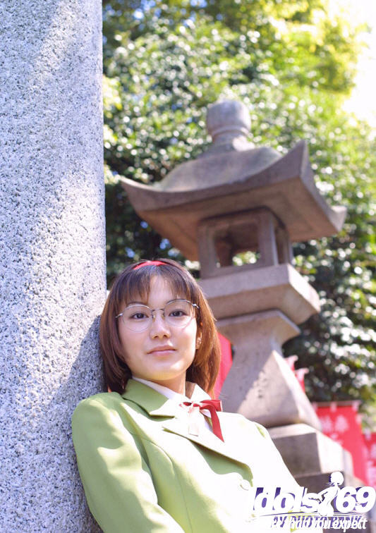 Naughty Asian Babe In Glasses And School Uniform Revealing Her Titties