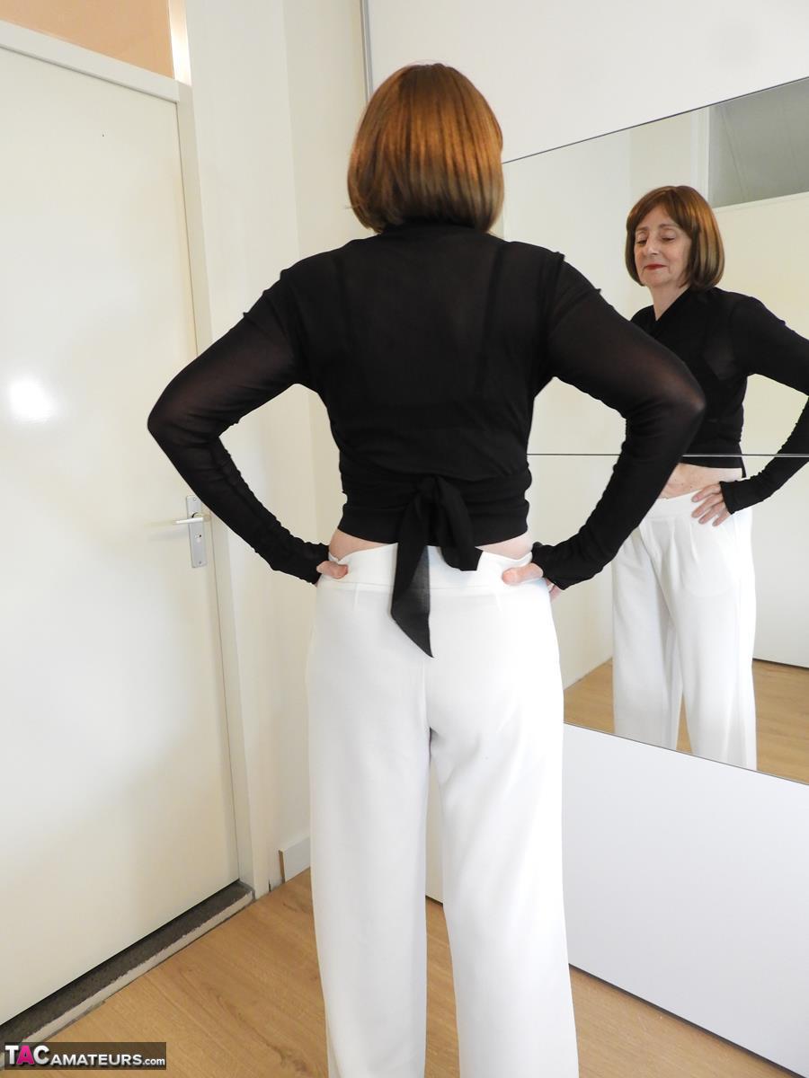 Caucasian Grandmother Kat Kitty Strips To Her Heels Before Mirror