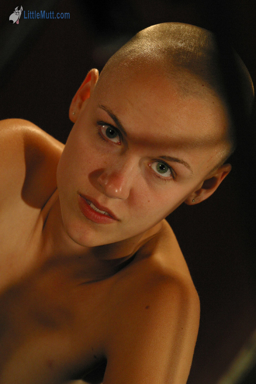 Young Karissa With Shaved Head Rubs Her Bald Pussy Nude