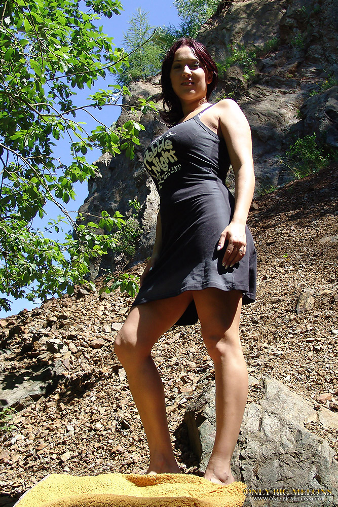 Busty Lea Magic Shows Big Butt While Masturbating On Rocky Slope