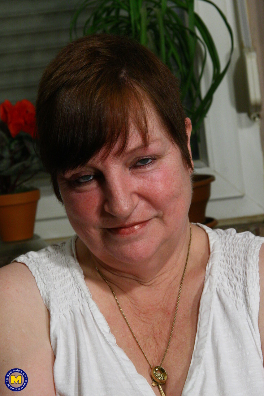 Short-Haired Granny Anita C Flaunts Fat Body And Toys Mature Snatch