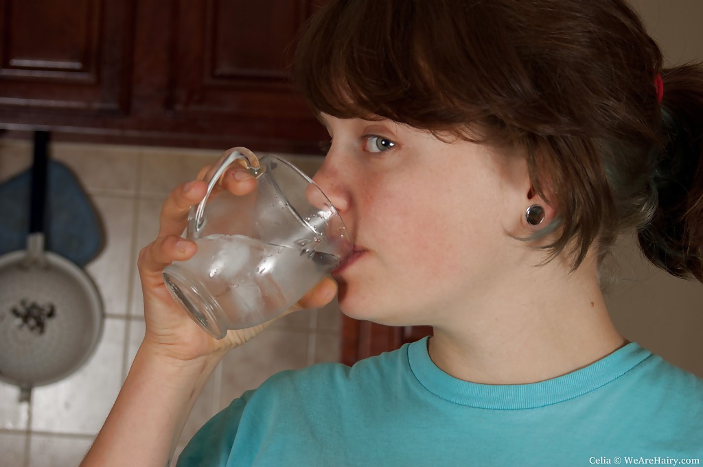 Celia: Fat Teen Babe Masturbating Shaggy Cunt In Kitchen